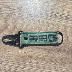 Oasis Live '25 Green Fabric Keychain